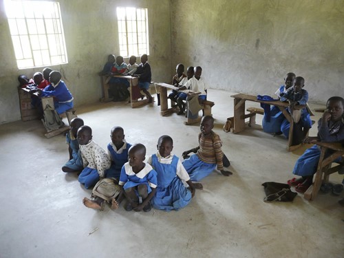 lack-of-facilities-across-schools-in-kenya-can-mean-3-or-4-children-sharing-a-desk-designed-for-2-or-even-working-from-the-floor_13289739953_o.jpg
